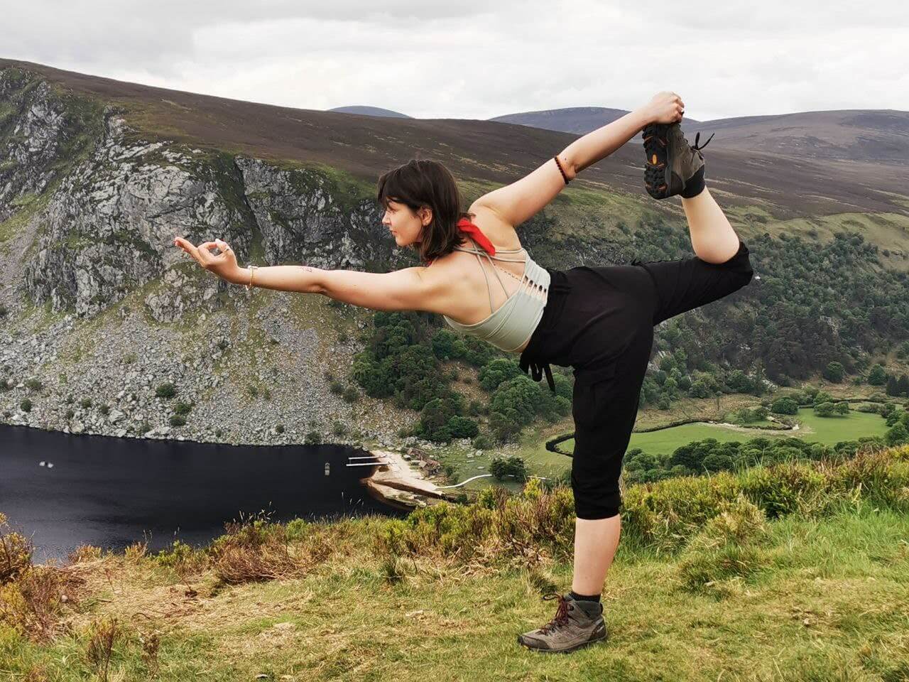 yoga pose on wicklow mauntain in ireland