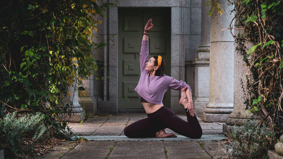 pigeon pose half with leg up held by the hand